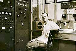 W4HHK at his 2-meter station during the early 1950s. The National HRO-50 receiver was used on 7 MHz with a 144-MHz converter. His amplifier ran a pair of 4-65As. The antenna was a 32-element collinear at 80 feet.
